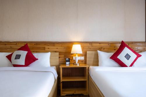 Postel nebo postele na pokoji v ubytování Sapa Florence Homestay & Garden
