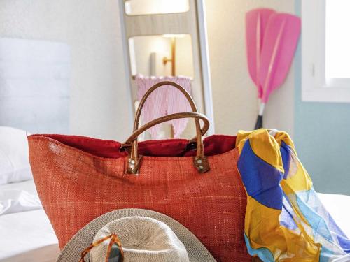 Ibis Budget Perpignan Sudにあるベッド