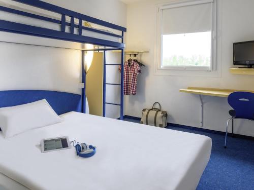 Cama o camas de una habitación en ibis budget Libourne