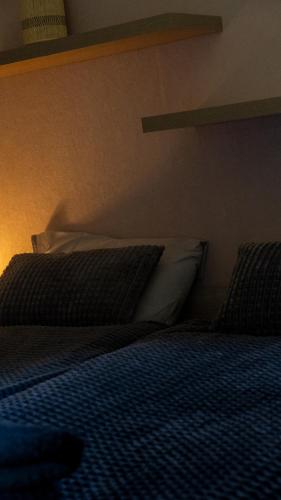 Postel nebo postele na pokoji v ubytování Gîte classé deux étoiles gite de France n 17 Signy-le-Petit