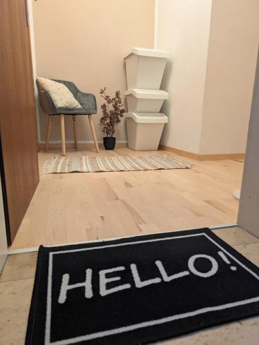 a welcome mat on the floor of a room at Ferienwohnung Flott in Marktoberdorf