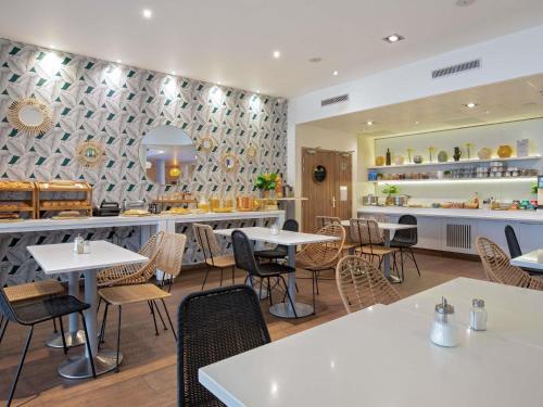 Restaurant ou autre lieu de restauration dans l'établissement Novotel Suites Perpignan Centre