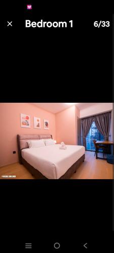 a bedroom with a white bed in a room at Eaton kl,2R1B,klcc,500mbps,2-4pax in Kuala Lumpur