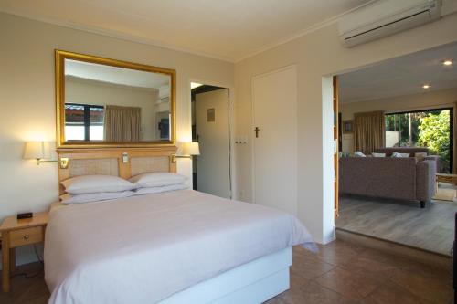 Postel nebo postele na pokoji v ubytování Constantia Vista Guest House