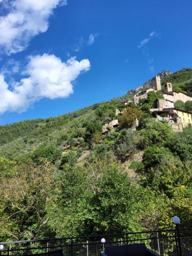 a building on the side of a hill at La casetta di monterivoso in Monterivoso
