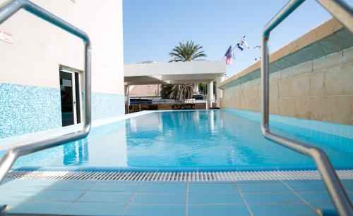 Bazén v ubytování Motel Aviv nebo v jeho okolí