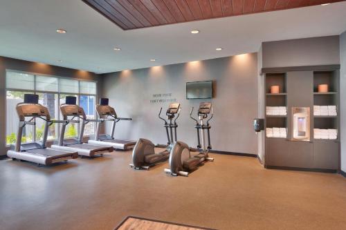 a gym with treadmills and ellipticals in a room at Fairfield Inn & Suites by Marriott Rockport in Rockport