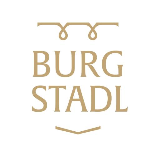 a sign that reads bruce stardilli with glasses at Burgstadl Aparthotel & Restaurant in Ladis
