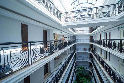 a view of the second floors of a building at Sirin Exclusive Hotel and Residence in Pattaya South