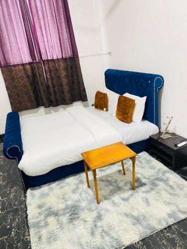 Postel nebo postele na pokoji v ubytování Sems Hillview Hotel