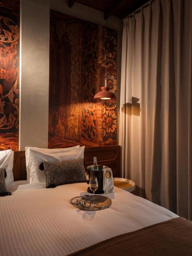 Łóżko lub łóżka w pokoju w obiekcie NiiRA