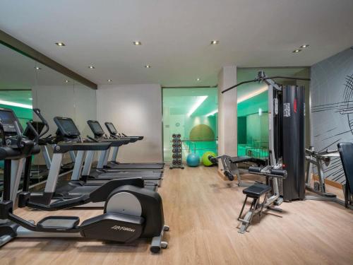 a gym with treadmills and elliptical machines at Novotel Istanbul Bosphorus Hotel in Istanbul