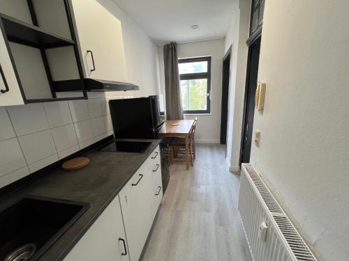 Η κουζίνα ή μικρή κουζίνα στο Hages Apartments