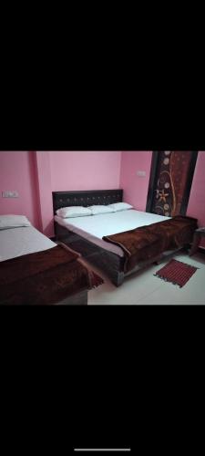 Ένα ή περισσότερα κρεβάτια σε δωμάτιο στο Shikhar guest house