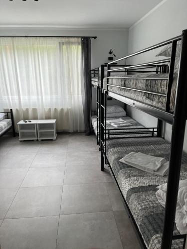 Postel nebo postele na pokoji v ubytování Zacisze Bis