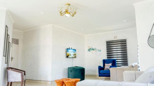 Ένα ή περισσότερα κρεβάτια σε δωμάτιο στο Sigma Court Apartments