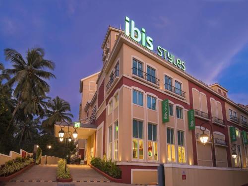 a building with a sign on the top of it at ibis Styles Goa Calangute - An Accor Brand in Calangute