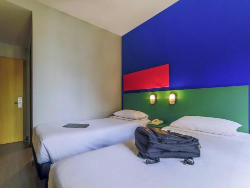 Katil atau katil-katil dalam bilik di ibis Styles SP Faria Lima