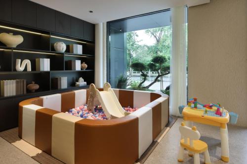 Posezení v ubytování Guilin Mingjiang Hotel