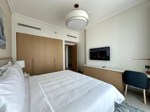 Postel nebo postele na pokoji v ubytování Address Vista Bahrain