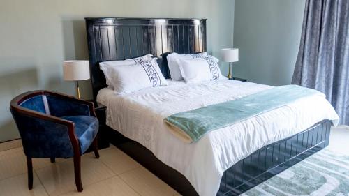 Ένα ή περισσότερα κρεβάτια σε δωμάτιο στο Sigma Court Apartments