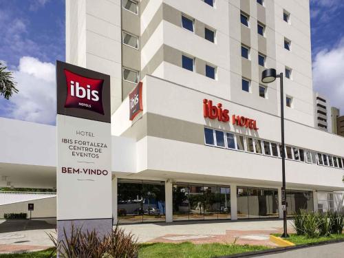 a building with a lobos hotel sign in front of it at ibis Fortaleza Centro de Eventos in Fortaleza