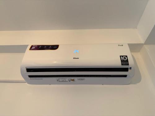 an air conditioner sitting on top of a ceiling at Little jay"s villa in Batigama