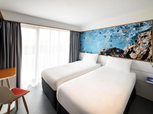 Ibis Styles Collioure Port Vendresにあるベッド
