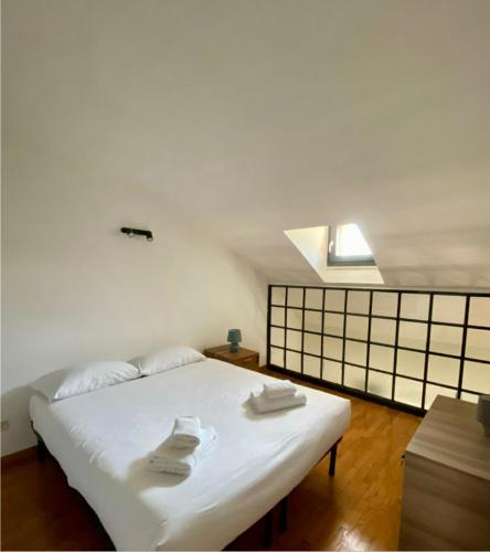 Ένα ή περισσότερα κρεβάτια σε δωμάτιο στο Emerald Apartment