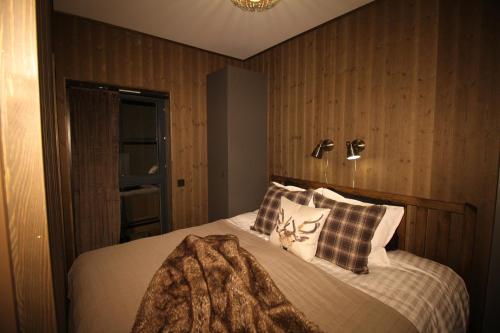 Giường trong phòng chung tại Fjällbäcken Pool and Padel