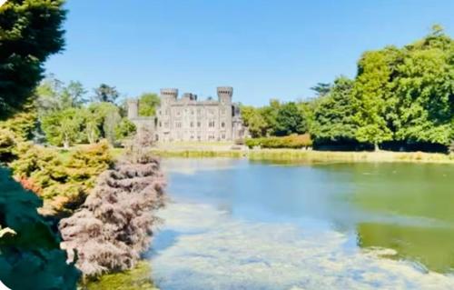 an image of a castle in the middle of a lake at Quiet Room in Wexford with Local Charm in Wexford
