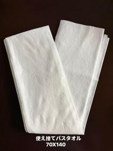 two white napkins sitting next to each other at PLUS 9 Station INN in Izumi-Sano