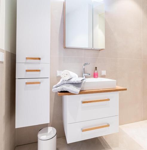a bathroom with a white sink and a mirror at ENGEL in Arnfels in Arnfels