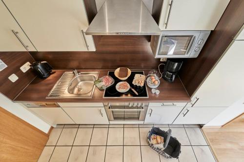 Η κουζίνα ή μικρή κουζίνα στο Seemuschel - 7