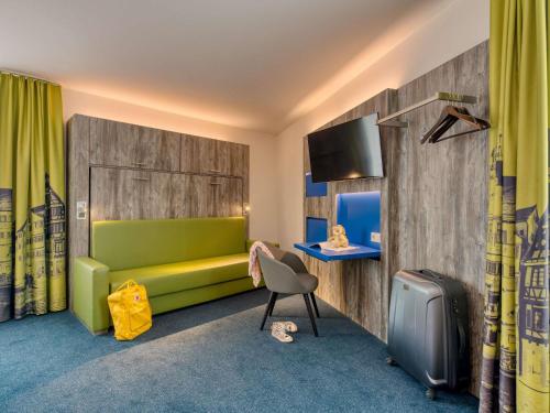 Televisyen dan/atau pusat hiburan di ibis Styles Tuebingen