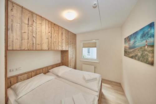 Postel nebo postele na pokoji v ubytování Pamir - 20