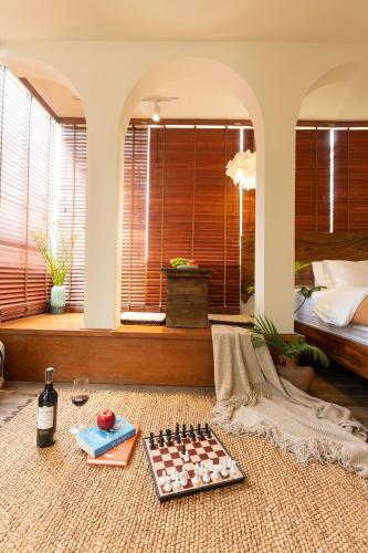 a room with a chess board on the floor at PINhome in Ho Chi Minh City