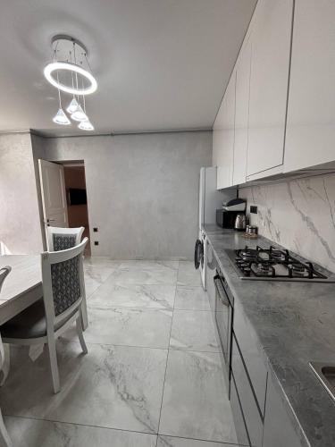 Η κουζίνα ή μικρή κουζίνα στο MarMar Guest House 2