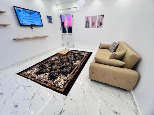 TV a/nebo společenská místnost v ubytování Muhammad Ali House