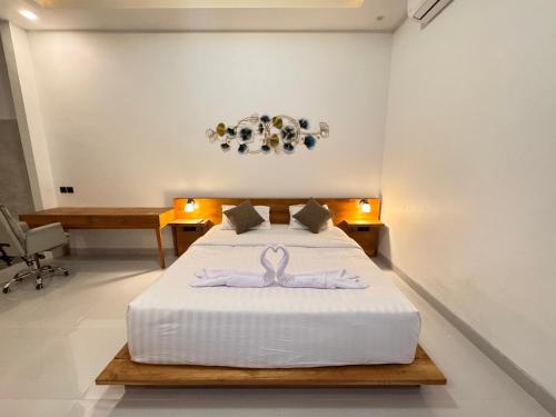 Postel nebo postele na pokoji v ubytování Maha Ritz private villa