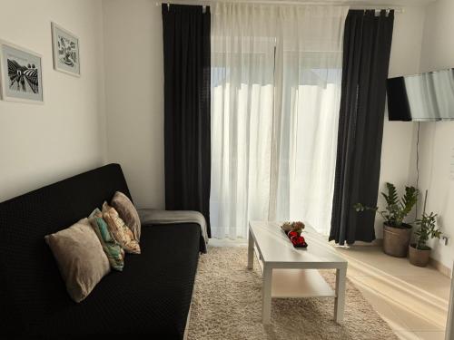 Χώρος καθιστικού στο Heni Apartments