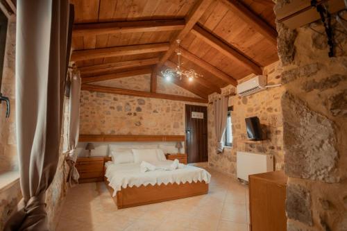 Katil atau katil-katil dalam bilik di Charming Stone Villa in Crete