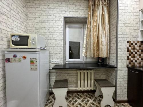 Η κουζίνα ή μικρή κουζίνα στο Аппартаменты