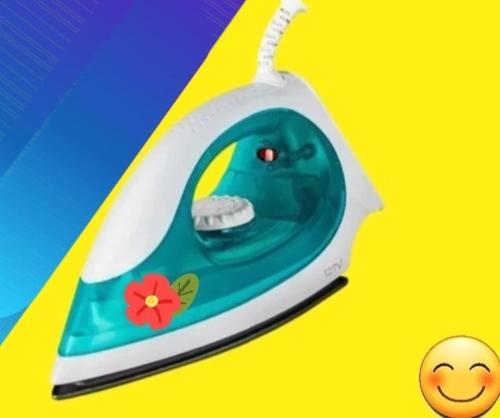 a toy boat with a face on it and a flower at Suíte Love in Paty do Alferes