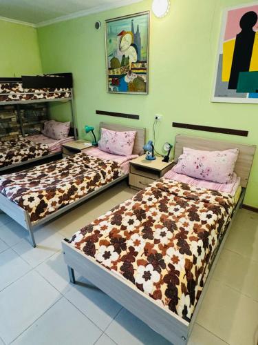 a room with two beds in a room at Lovely Goris in Goris