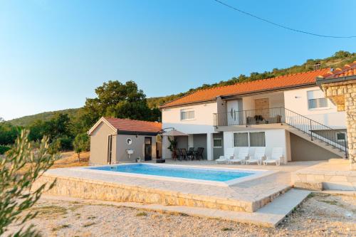 Πισίνα στο ή κοντά στο Guesthouse Papac Apartments