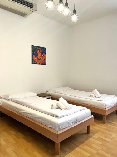 Postel nebo postele na pokoji v ubytování GuestHouse Lugano Studio Apartments by LR