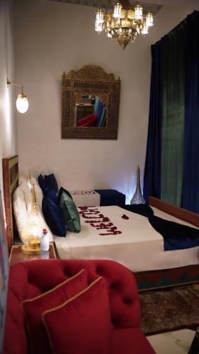 Cama o camas de una habitación en Riad Jnane Fes Medina & Luxury Palace