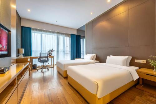 Katil atau katil-katil dalam bilik di SLOWCOM-Xingyue Pa Zhou Apartment