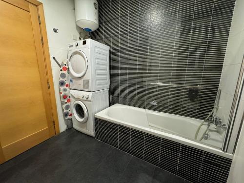 Ένα μπάνιο στο Bayview Seafront 5A